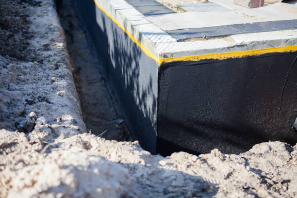 Professional Exterior Waterproofing technician working in Covington, GA